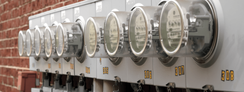 Prepaid electricity meters installed on a Texas apartment building